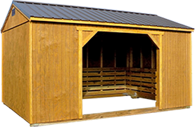 Wooden animal shelter shed with open front design provides protection and ventilation for livestock or pets in backyard settings. Versatile backyard buildings like shelters add function while enhancing outdoor space usability.